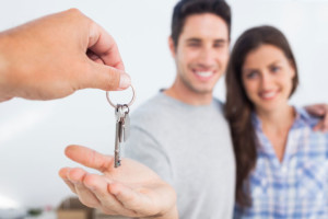 handing over keys to home buyer first time home buyer couple