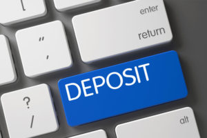 online deposit keyboard blue deposit key close up